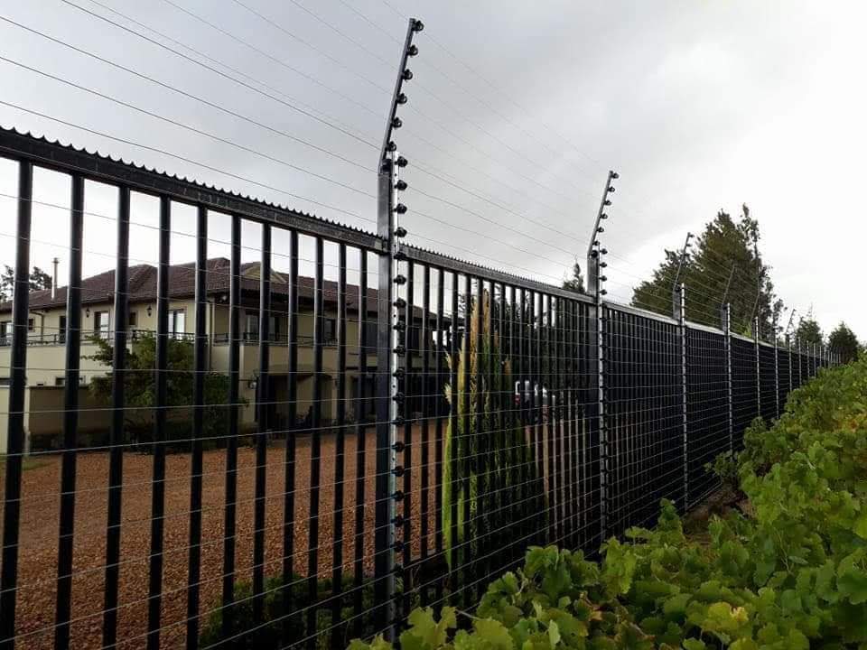 Electric fence installation on a residential boundary wall in Somerset West