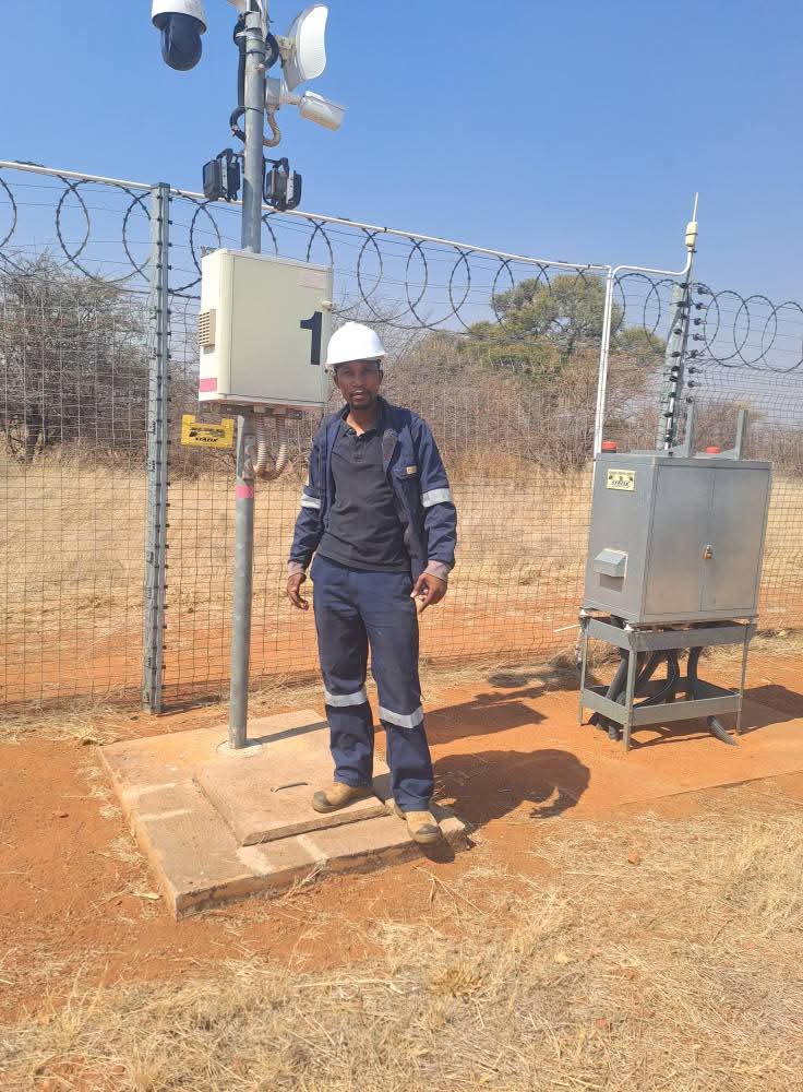 Archie Maclean, founder of Cape Smart Automation, at an electric fence security installation